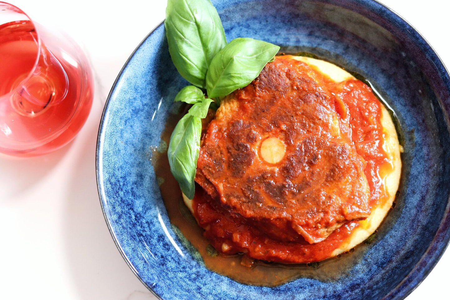 Succulent "Osso buco" Braised in rich Italian tomato sauce