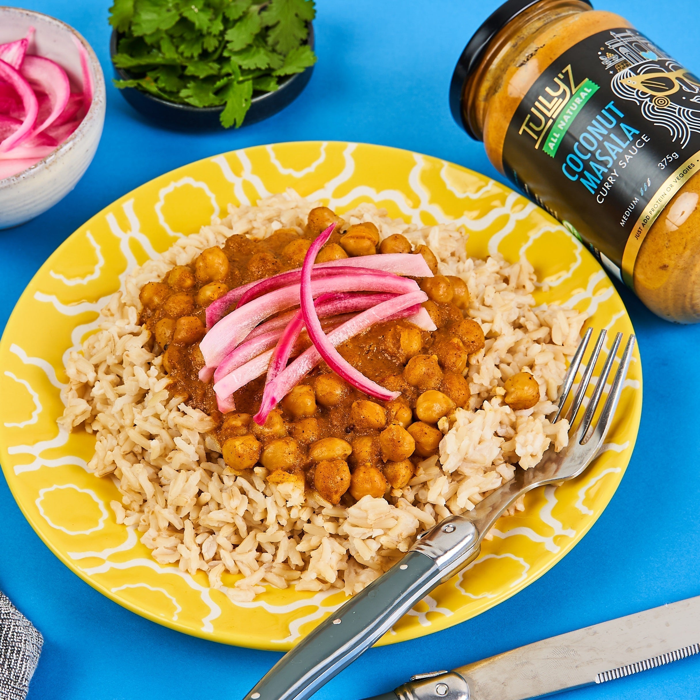 Coconut Masala Chickpea Curry with Rice and Red Onion - A Satisfying Vegan Dish